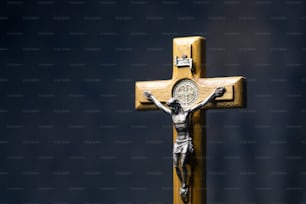 a cross with a crucifix in the middle of it