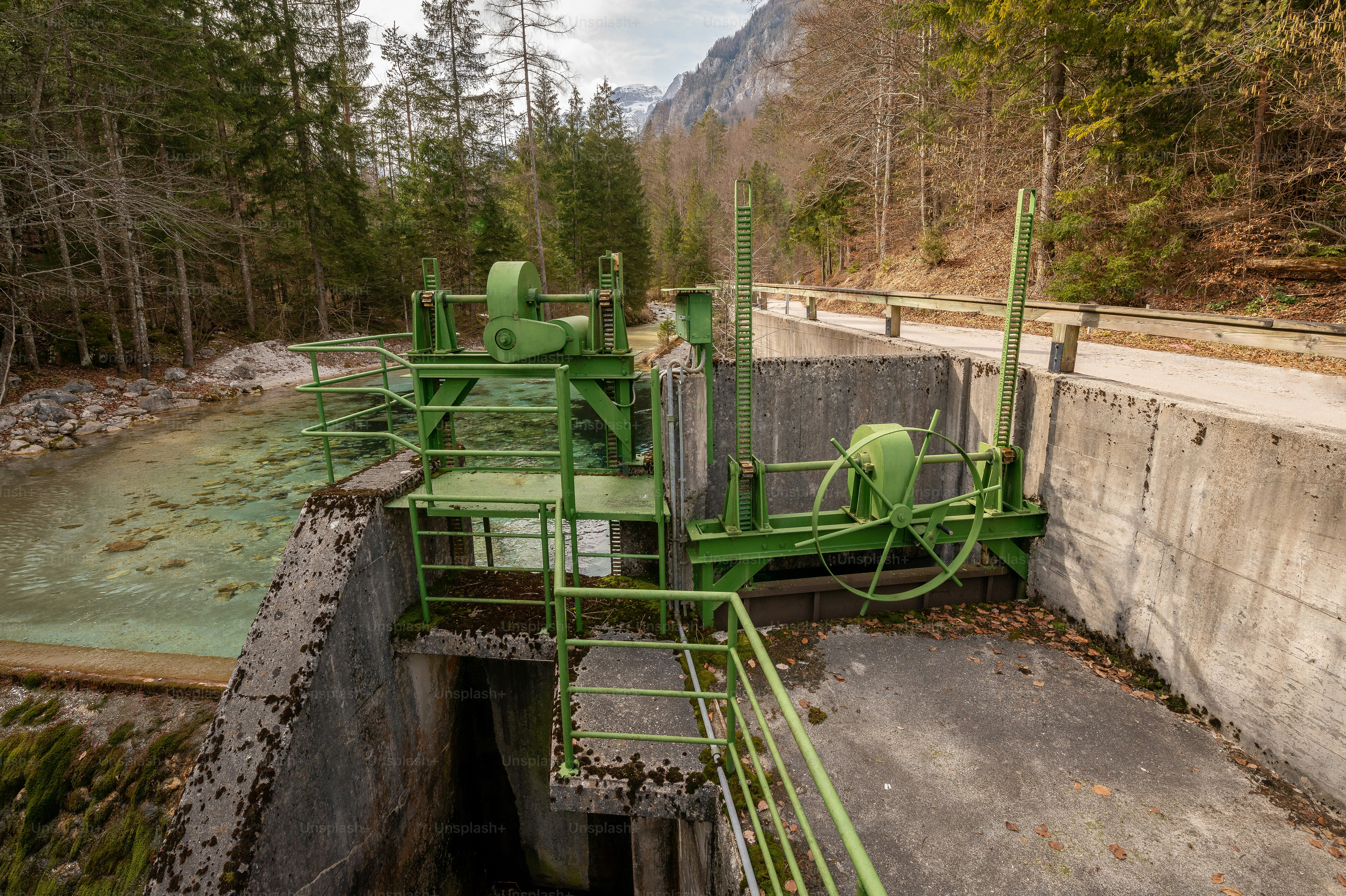 A vintage hydropower plant on a small current near the village Mojstrana in Slovenia, Europe. It used to supply the whole village with electricity. The power plant is still fully functional and part of the existing electrical grid.