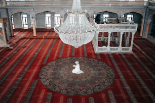 a chandelier hanging from the ceiling of a room