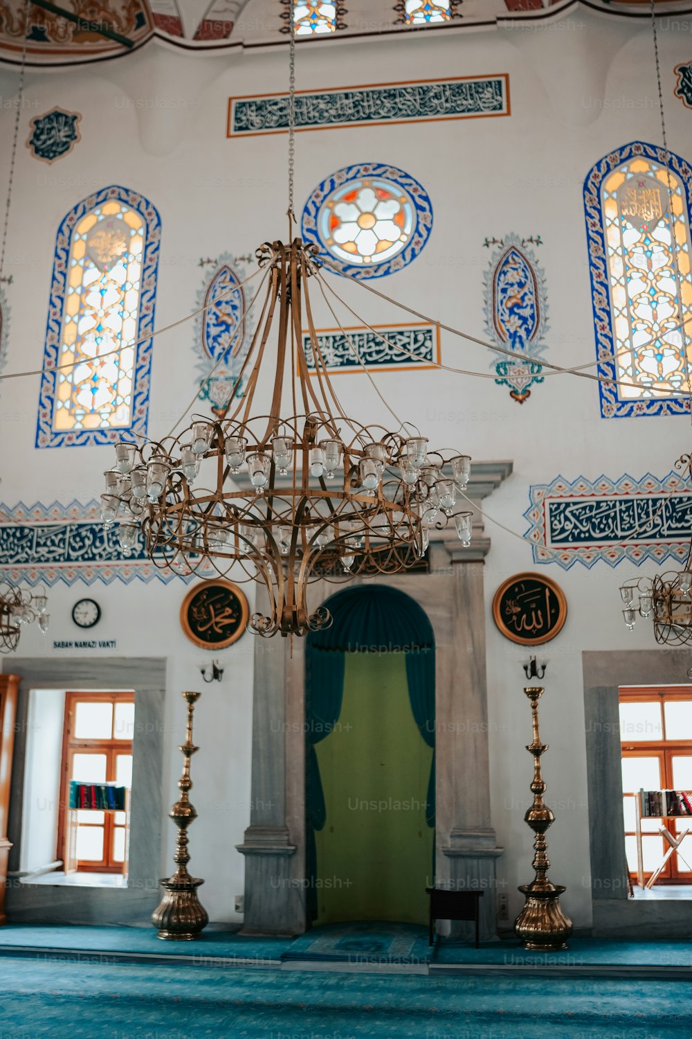 a chandelier hanging from the ceiling of a room