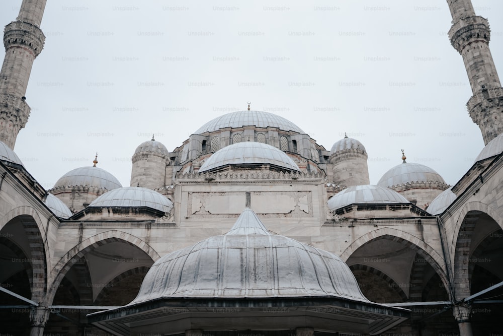 a view of a building with many arches and domes