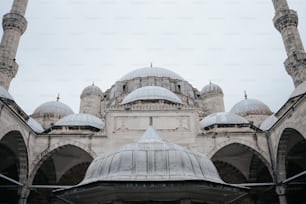 a view of a building with many arches and domes