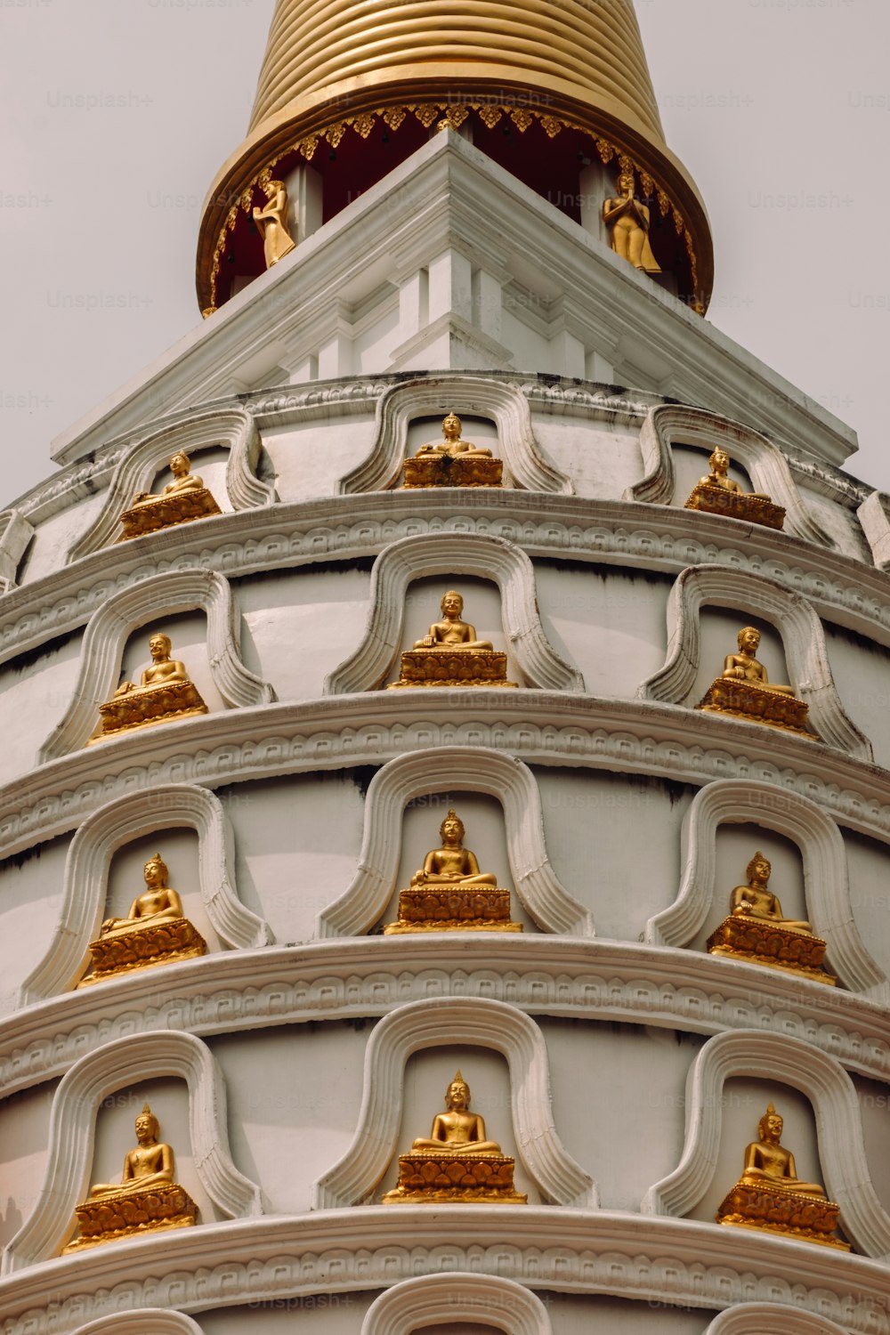 the top of a building with a gold dome