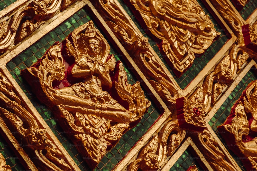 a close up of a gold wall decoration