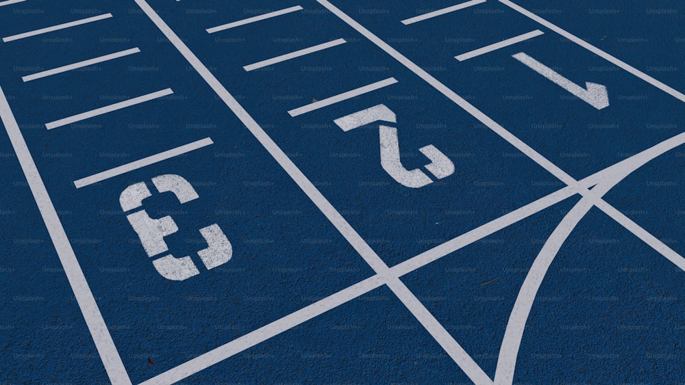 a close up of a running track with numbers on it