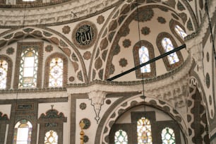 an ornate building with stained glass windows and arches