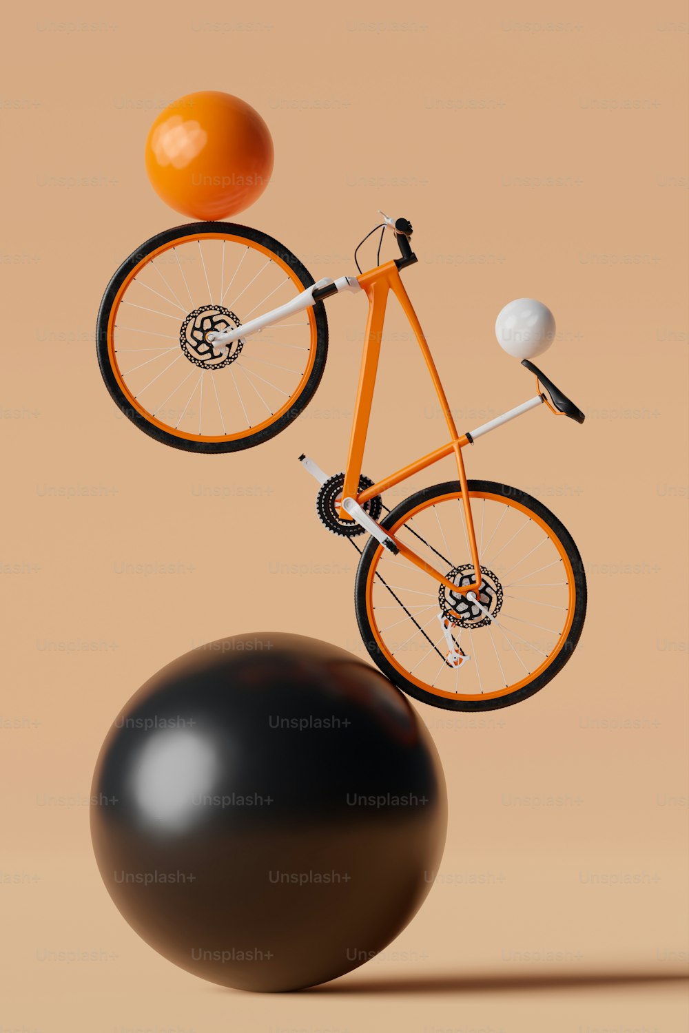 Una bicicleta naranja balanceándose sobre una bola negra