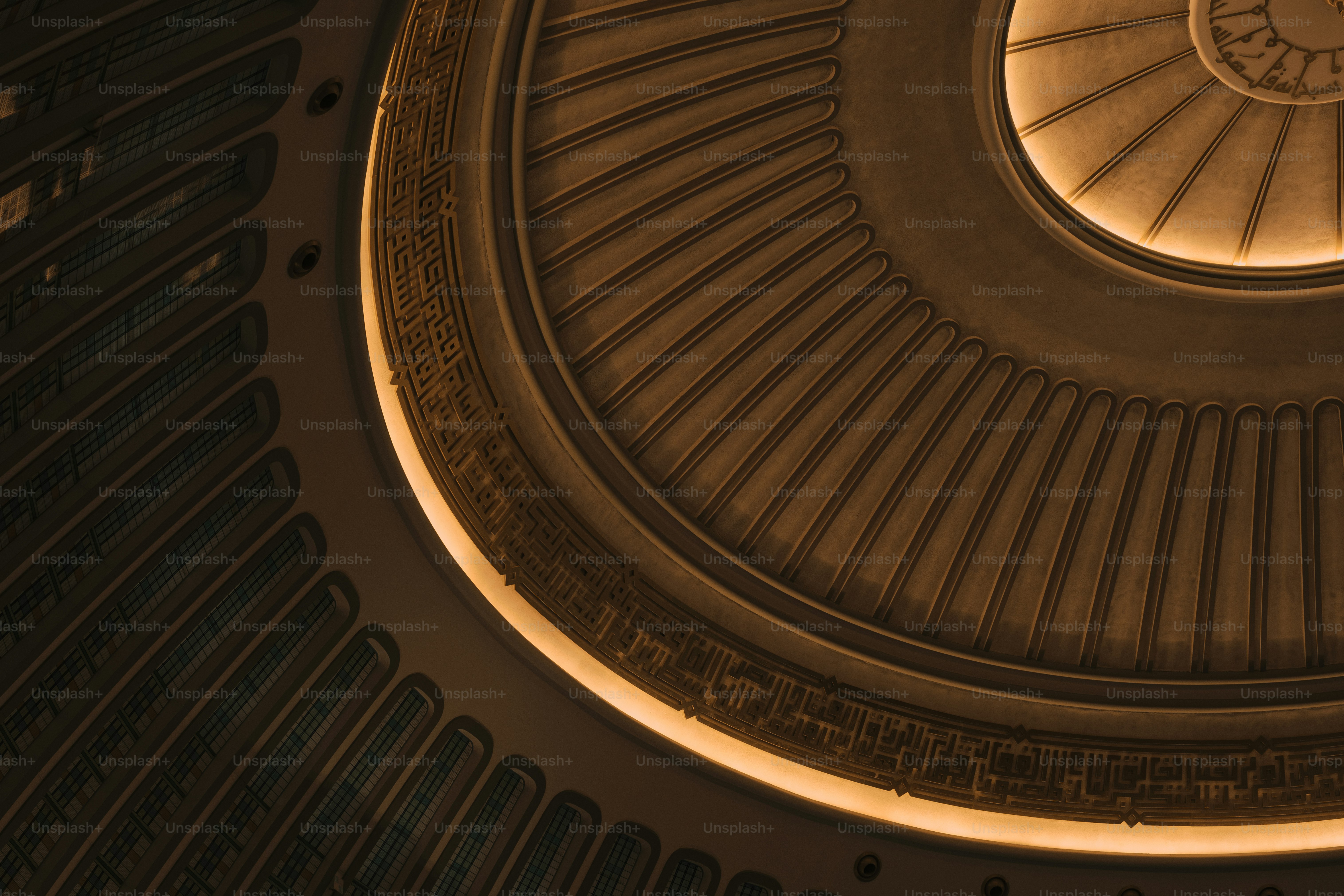 the ceiling of a building with a circular light