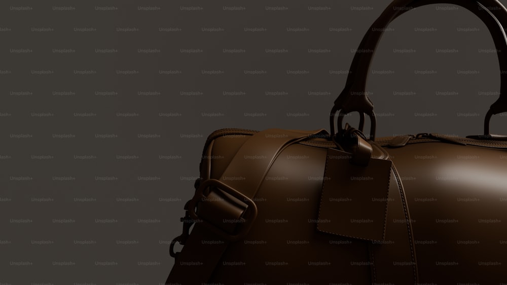 a brown leather bag with a brown handle