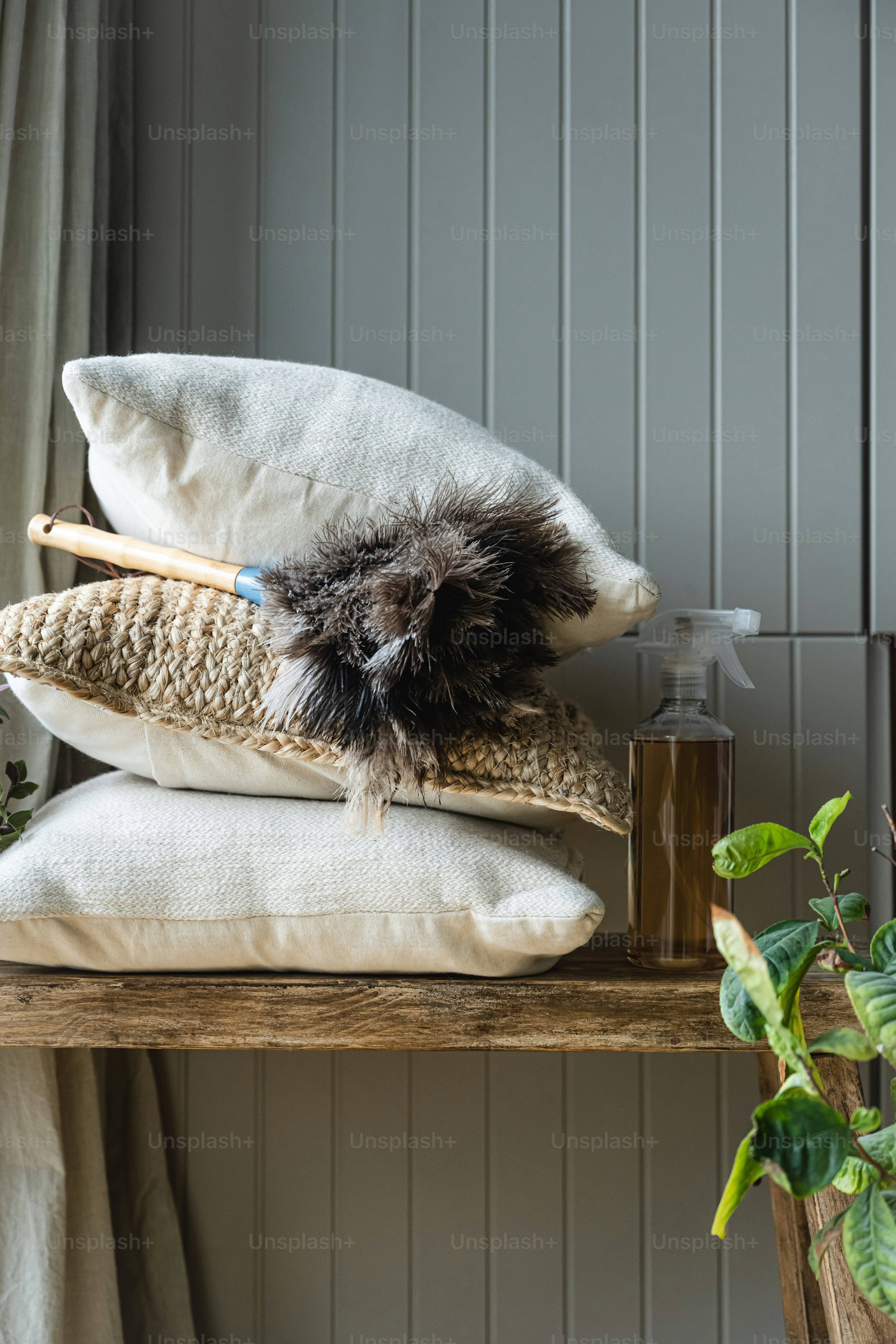 a couple of pillows sitting on top of a wooden table