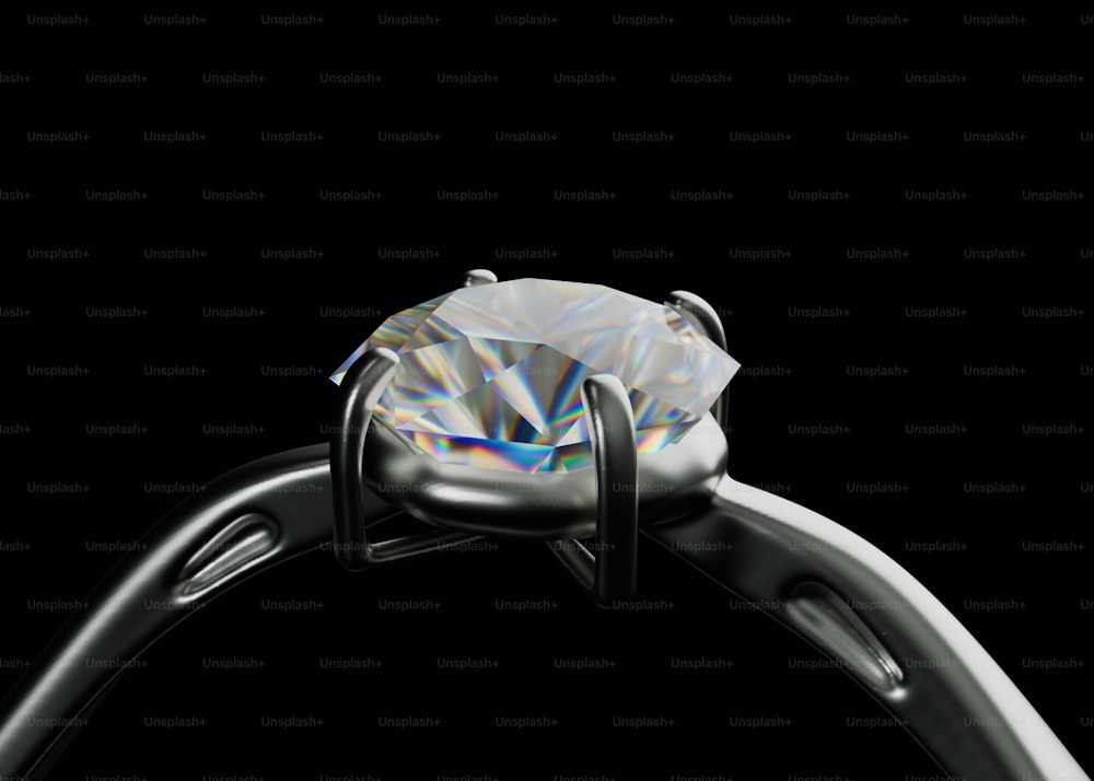 a close up of a diamond ring on a black background