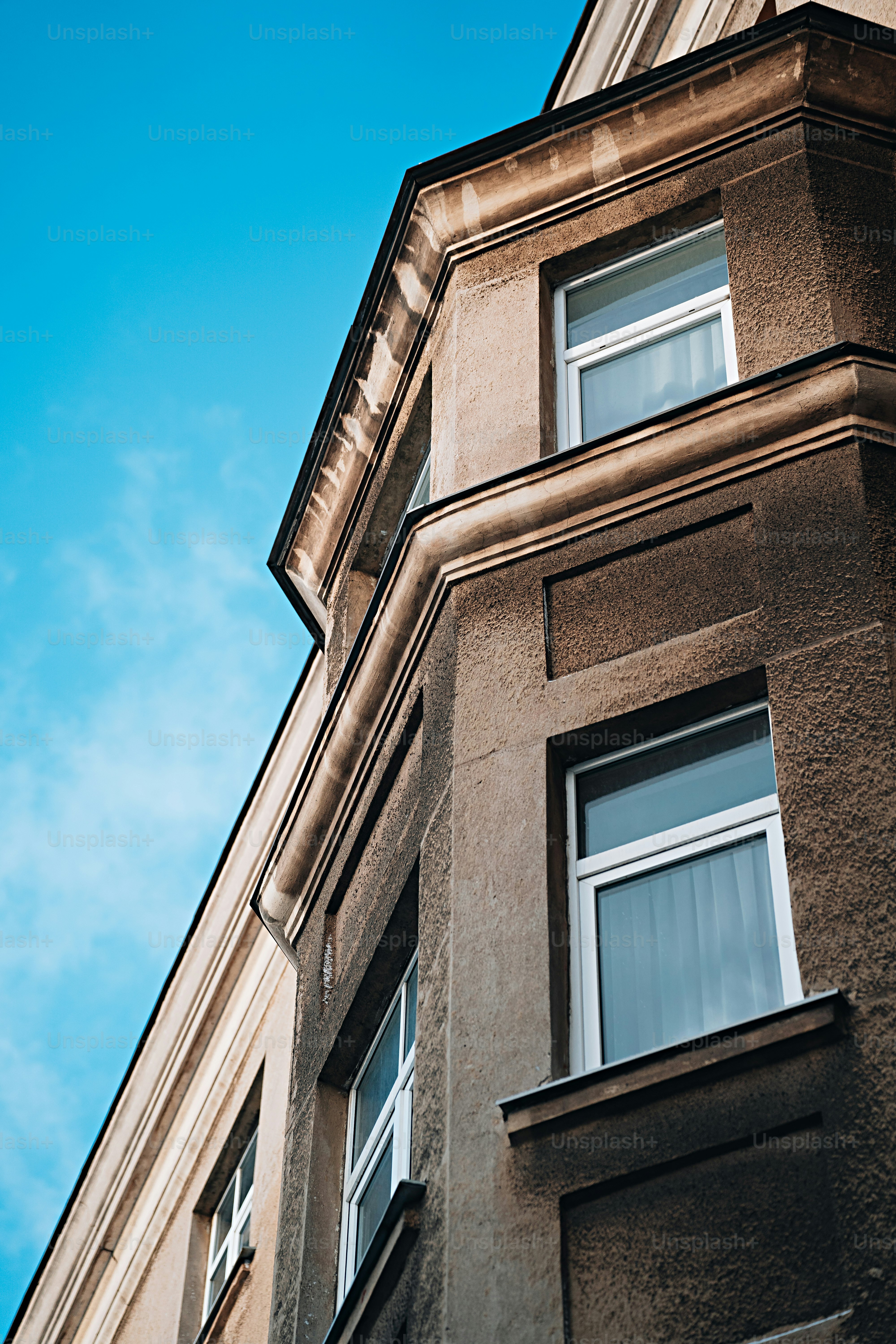a tall building with a clock on the side of it