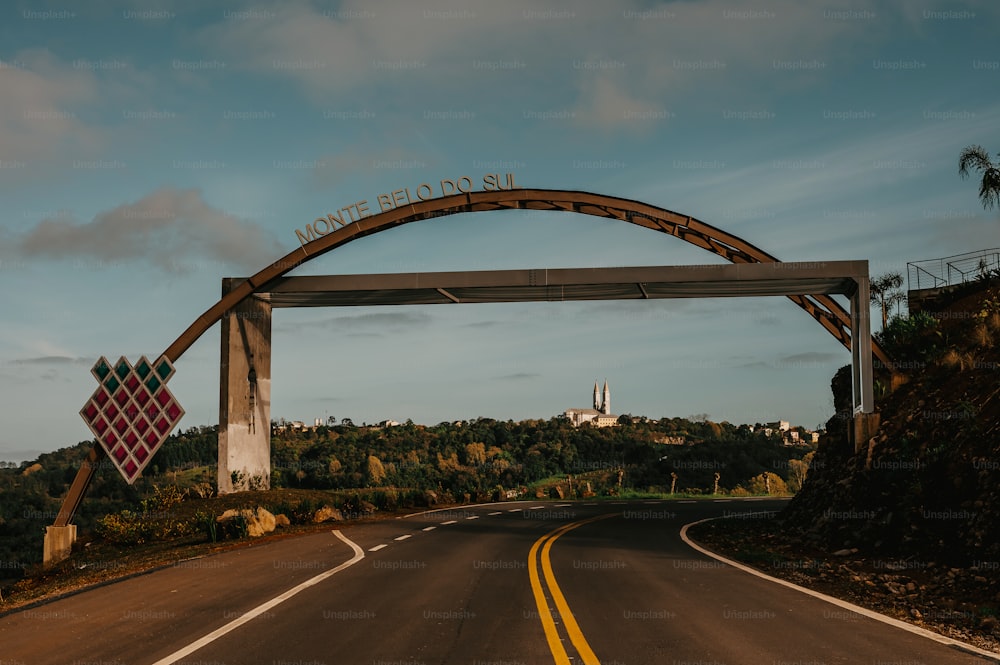 a road that has a sign on the top of it