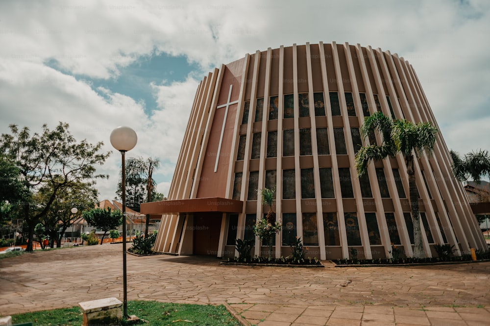 a tall building with a circular design on top of it