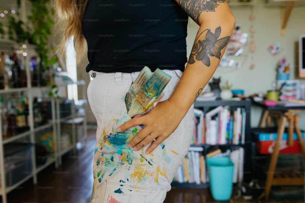 a woman with a tattoo on her arm