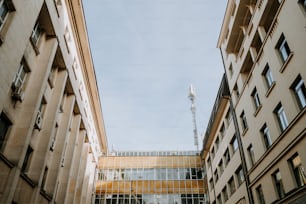 a tall building sitting next to another tall building