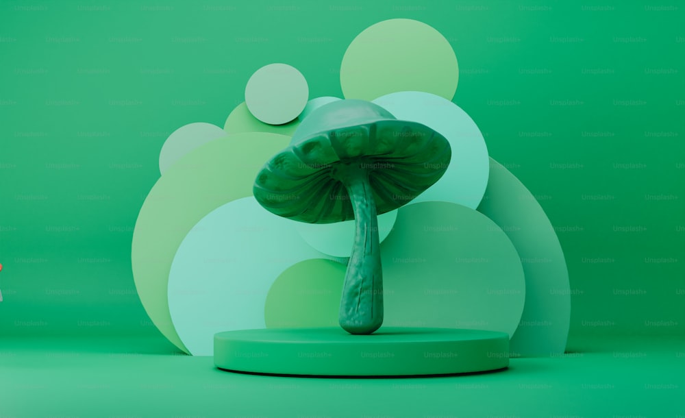 uma escultura verde com um cogumelo em cima dela