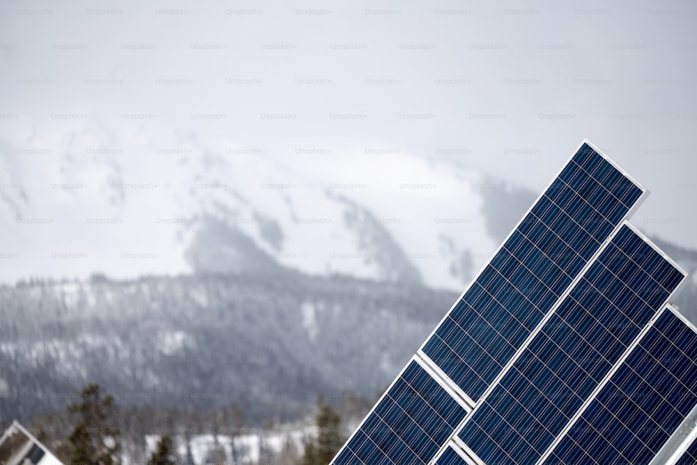 a group of solar panels on top of a roof