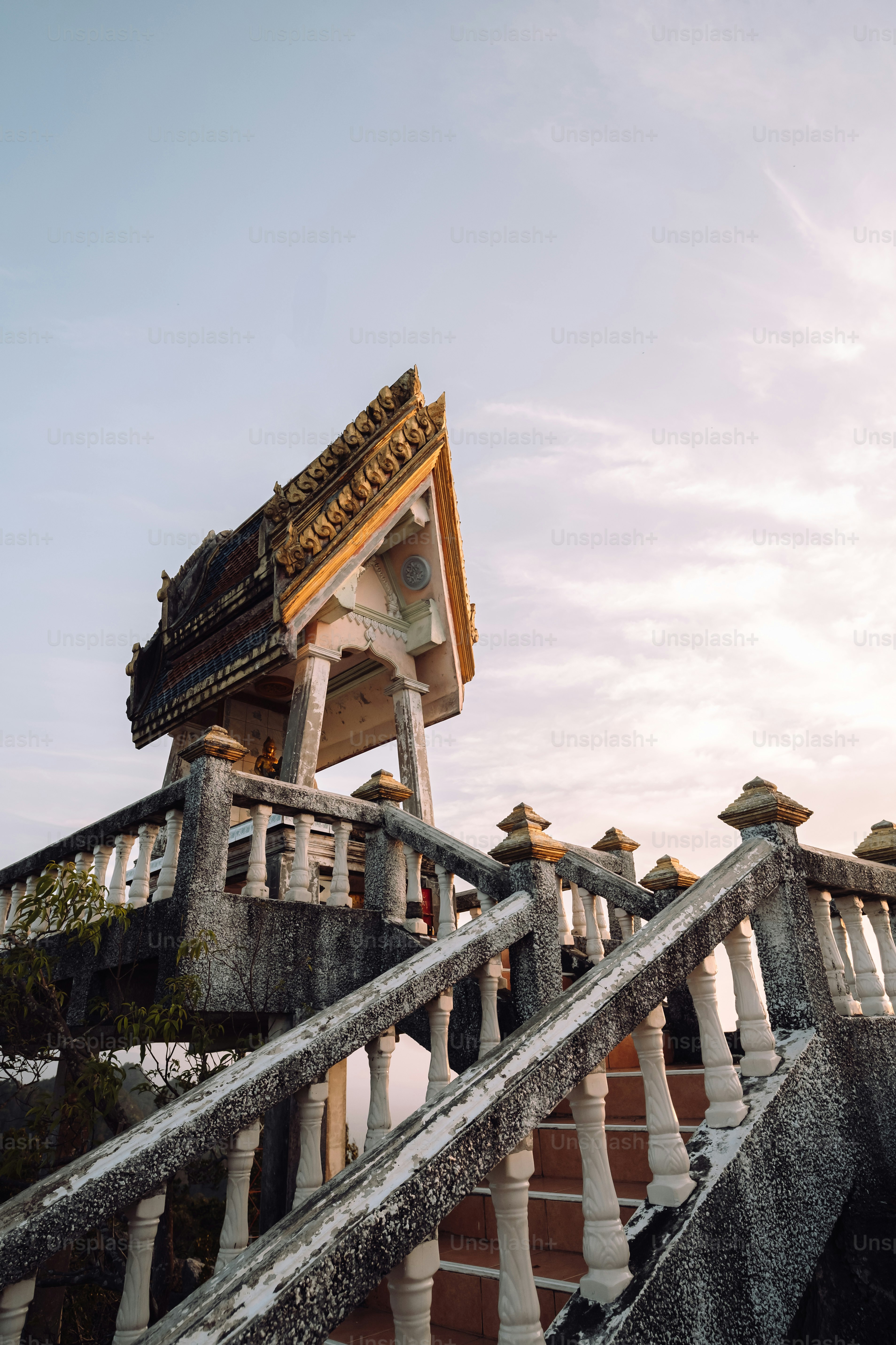 a stair case with a clock on top of it