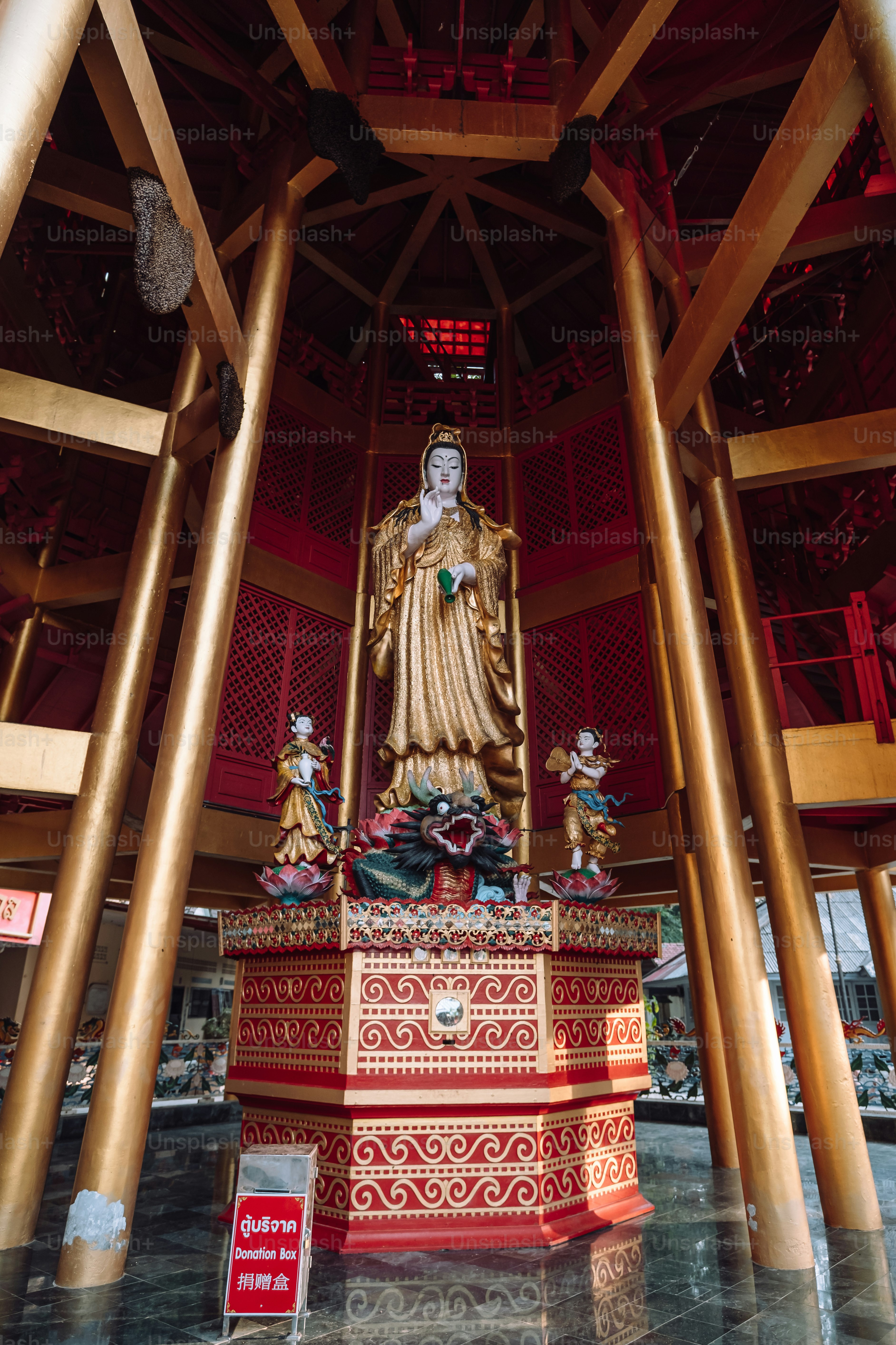 a statue of a buddha in a large room