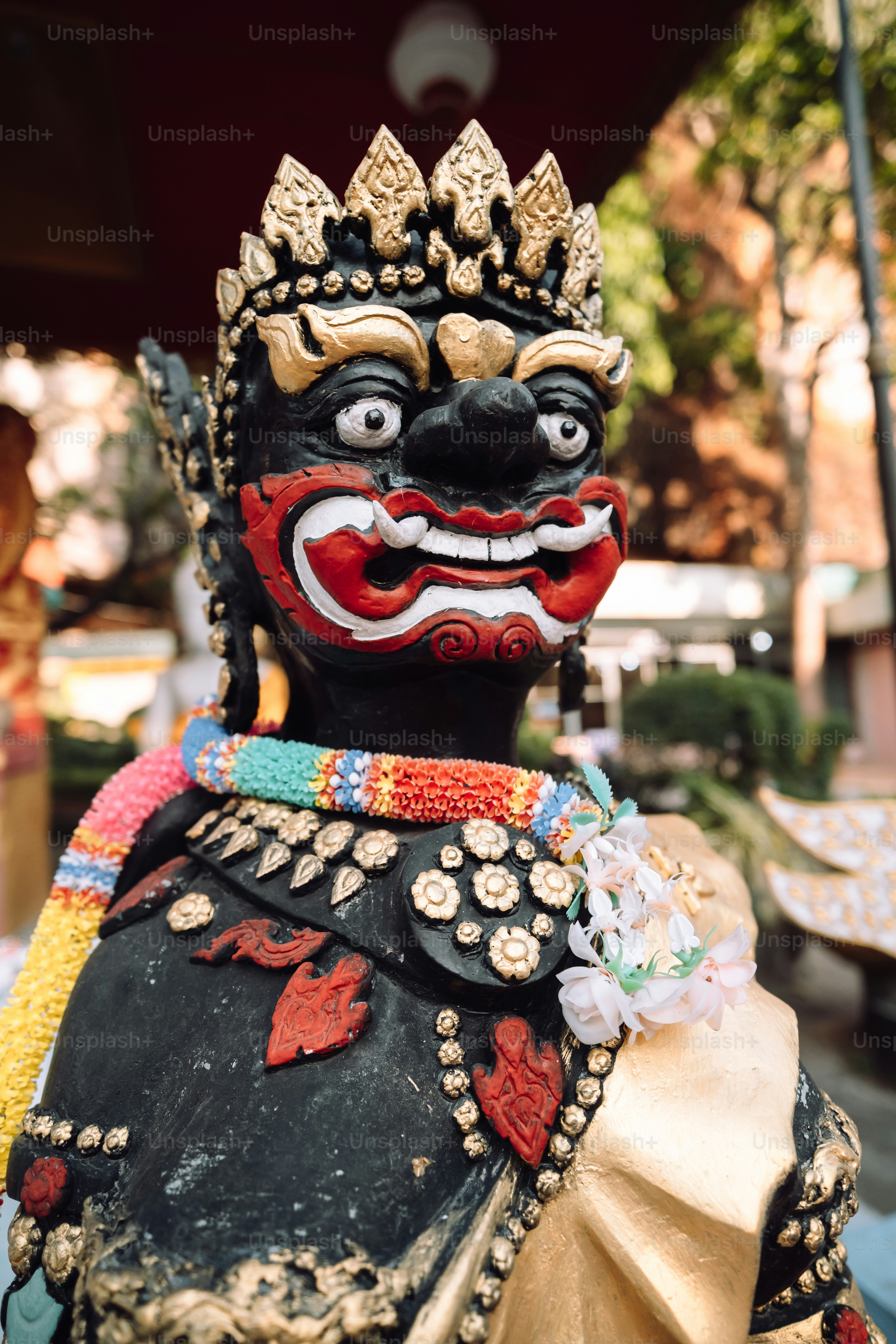 a close up of a statue of a person wearing a costume