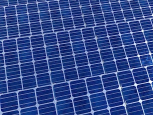 a close up of a solar panel on a building