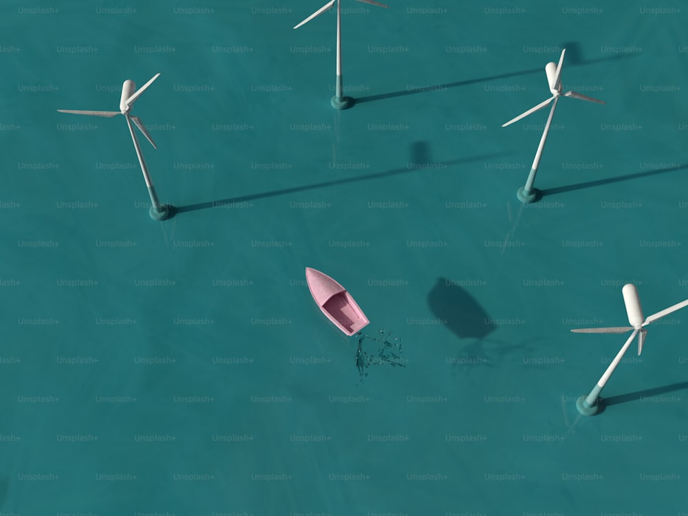 水域の上に浮かぶ風車のグループ