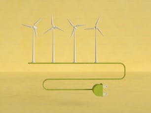 Una fila di turbine eoliche su uno sfondo giallo
