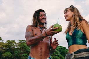 a man and a woman standing next to each other