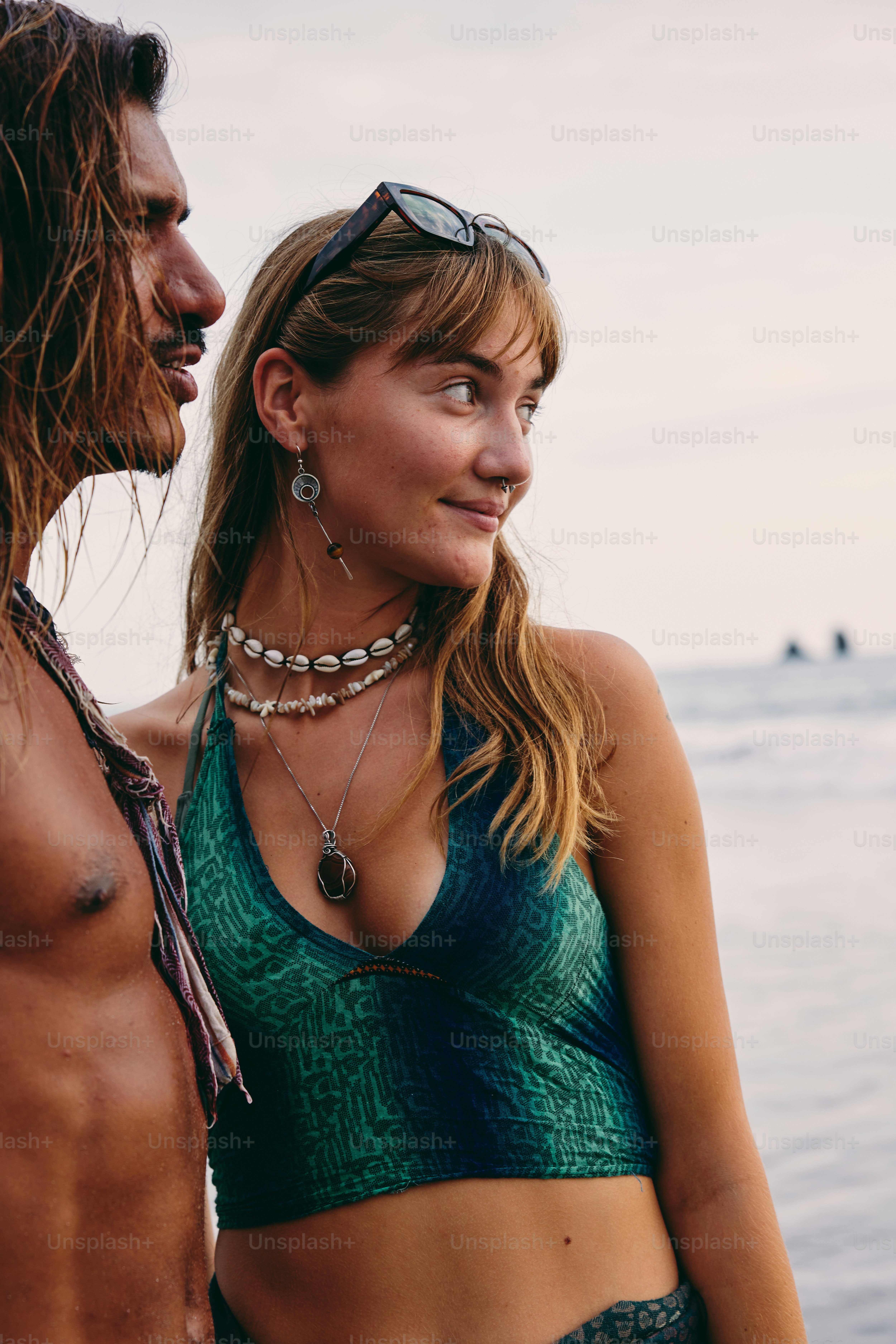 a man and a woman standing next to each other