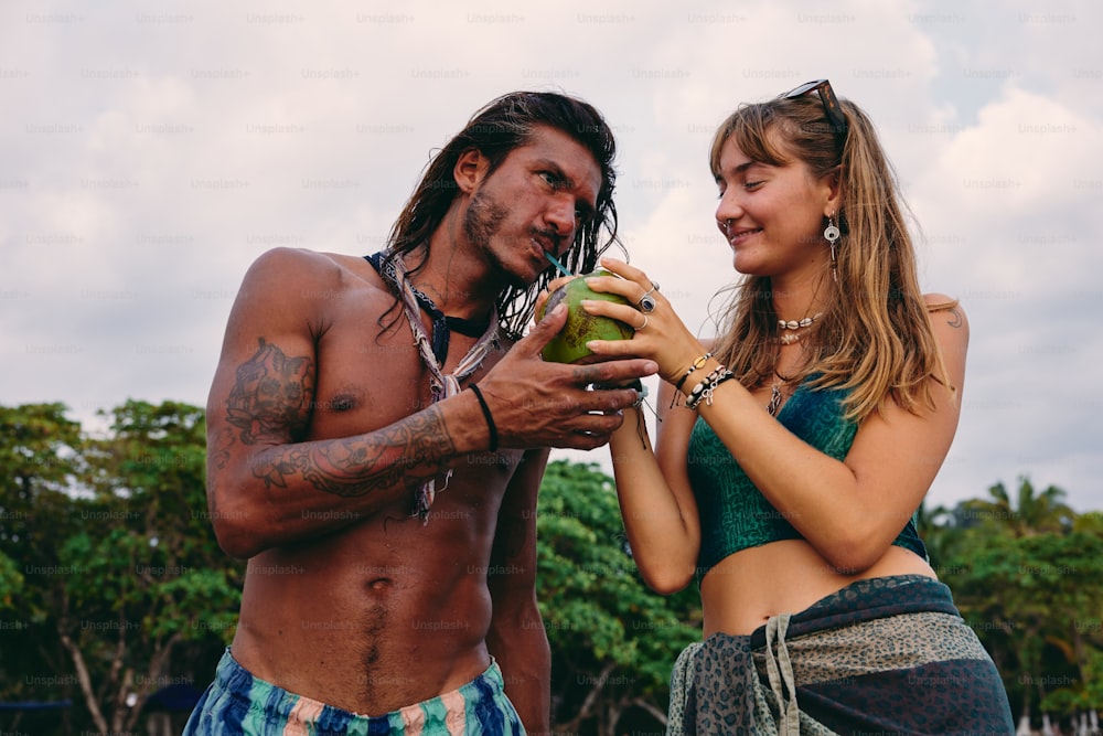 a man and a woman standing next to each other