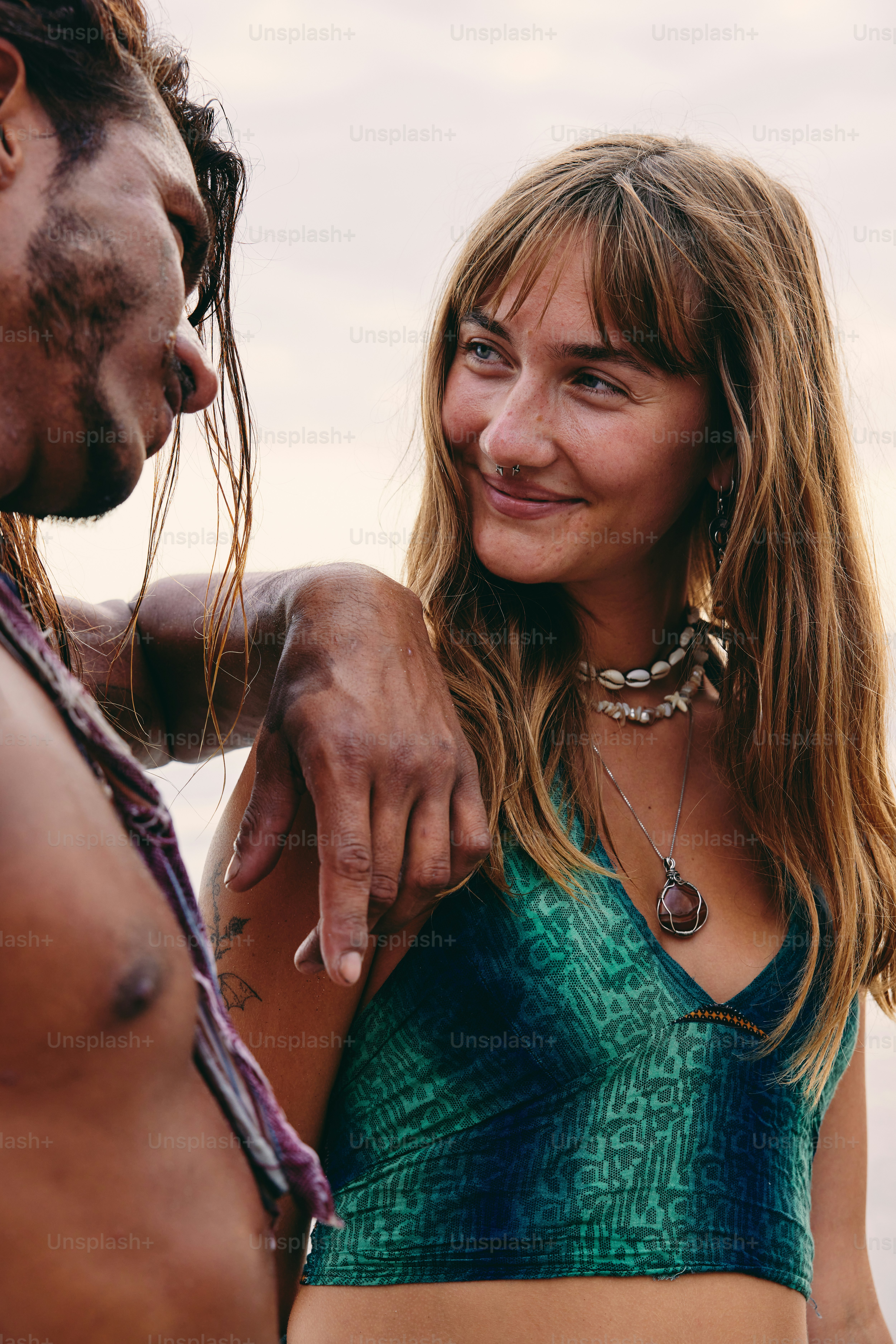 a man and a woman standing next to each other