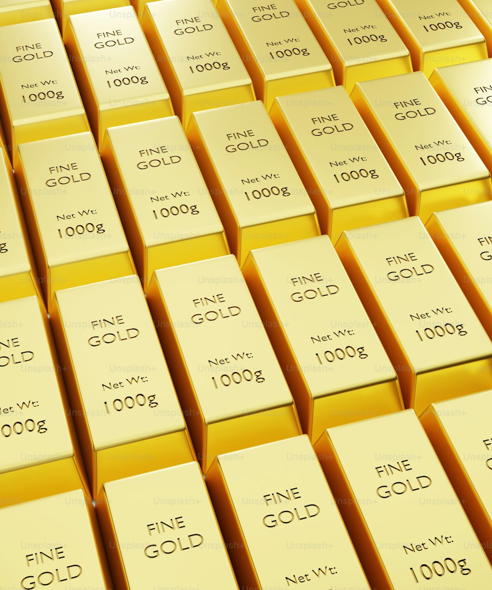 a large amount of gold bars stacked on top of each other
