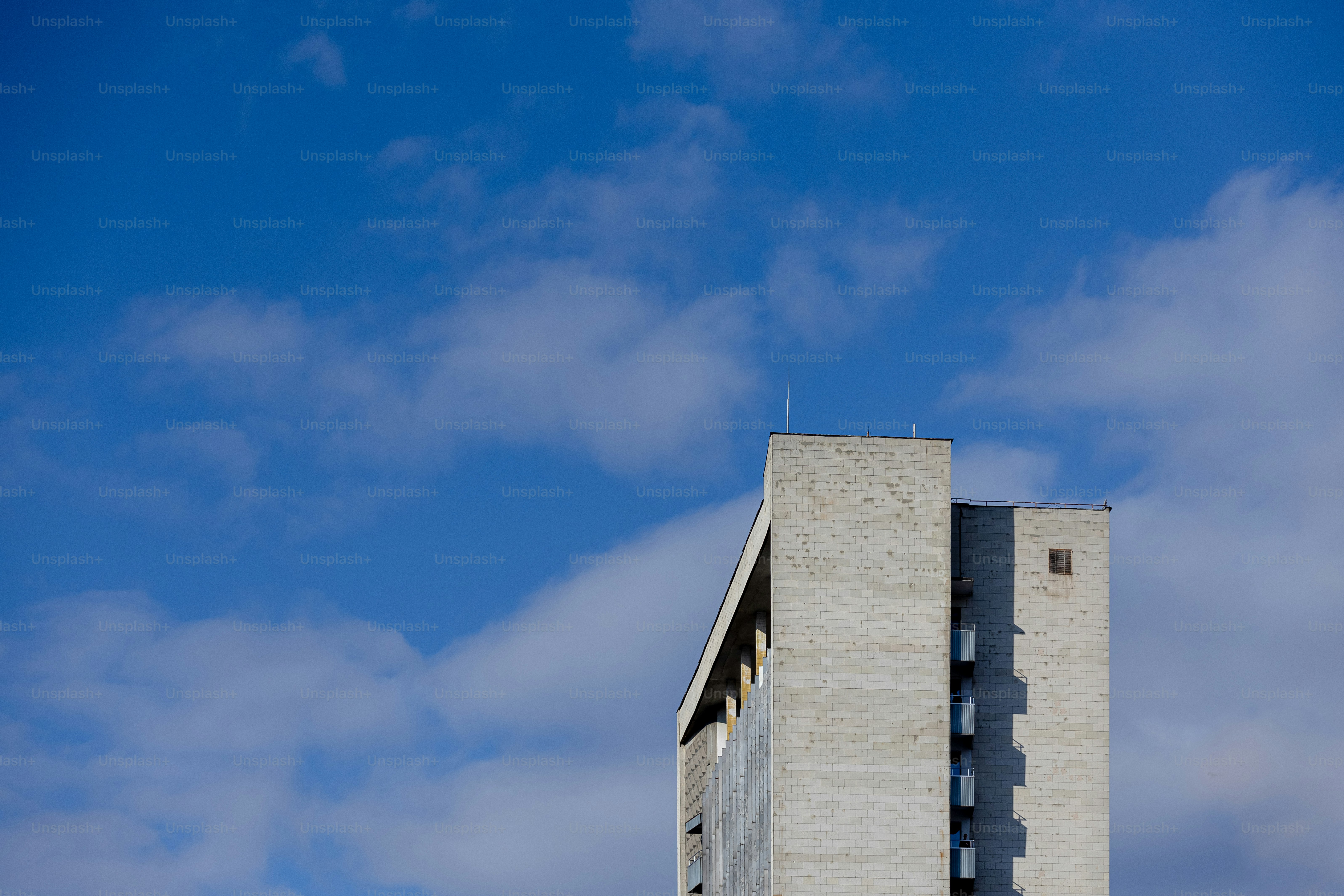 a tall building with a clock on the top of it