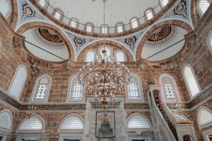 a chandelier hanging from the ceiling of a building