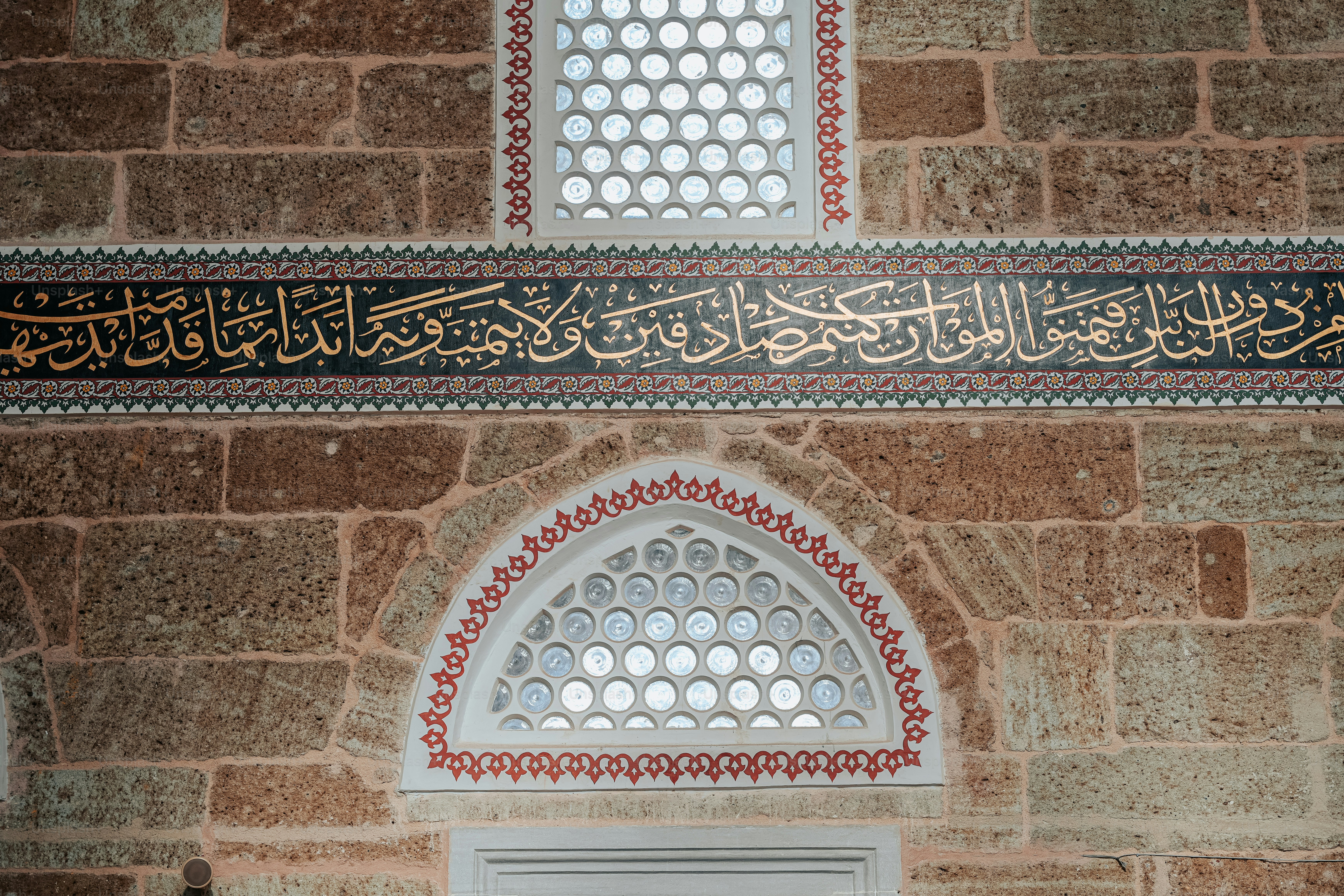 a close up of a building with a door and window