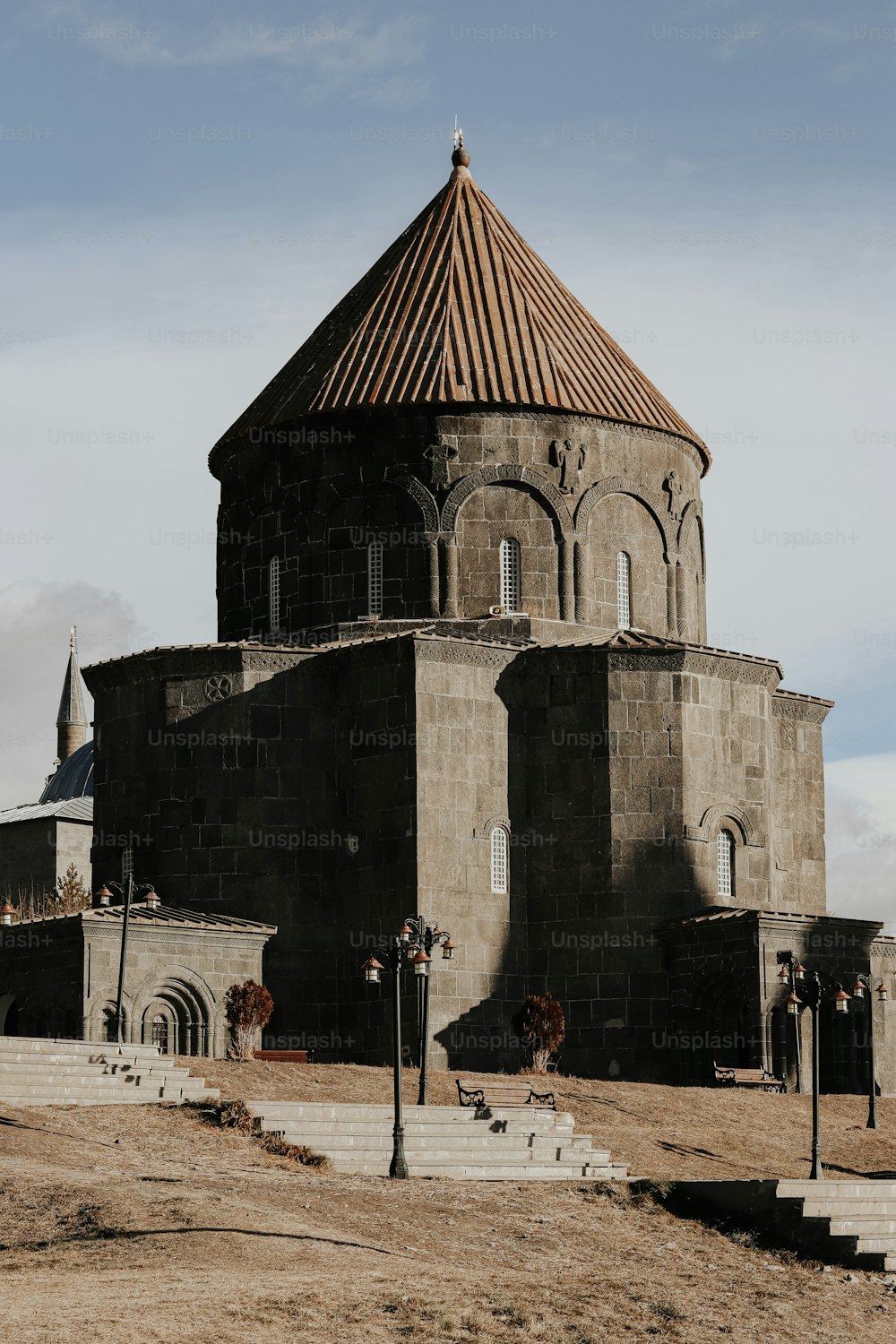 a large building with a tower and a clock on the top of it