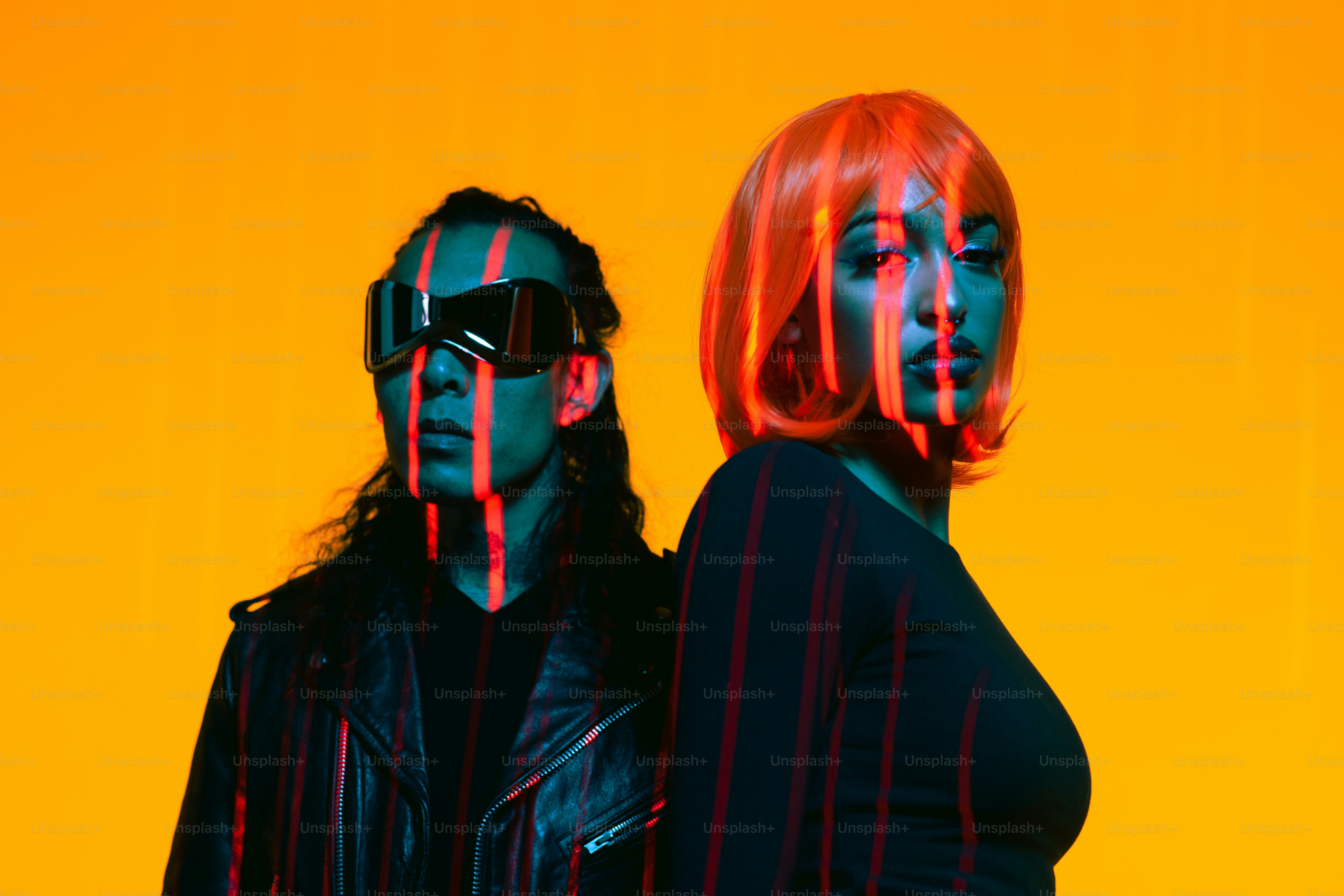 a couple of people standing next to each other