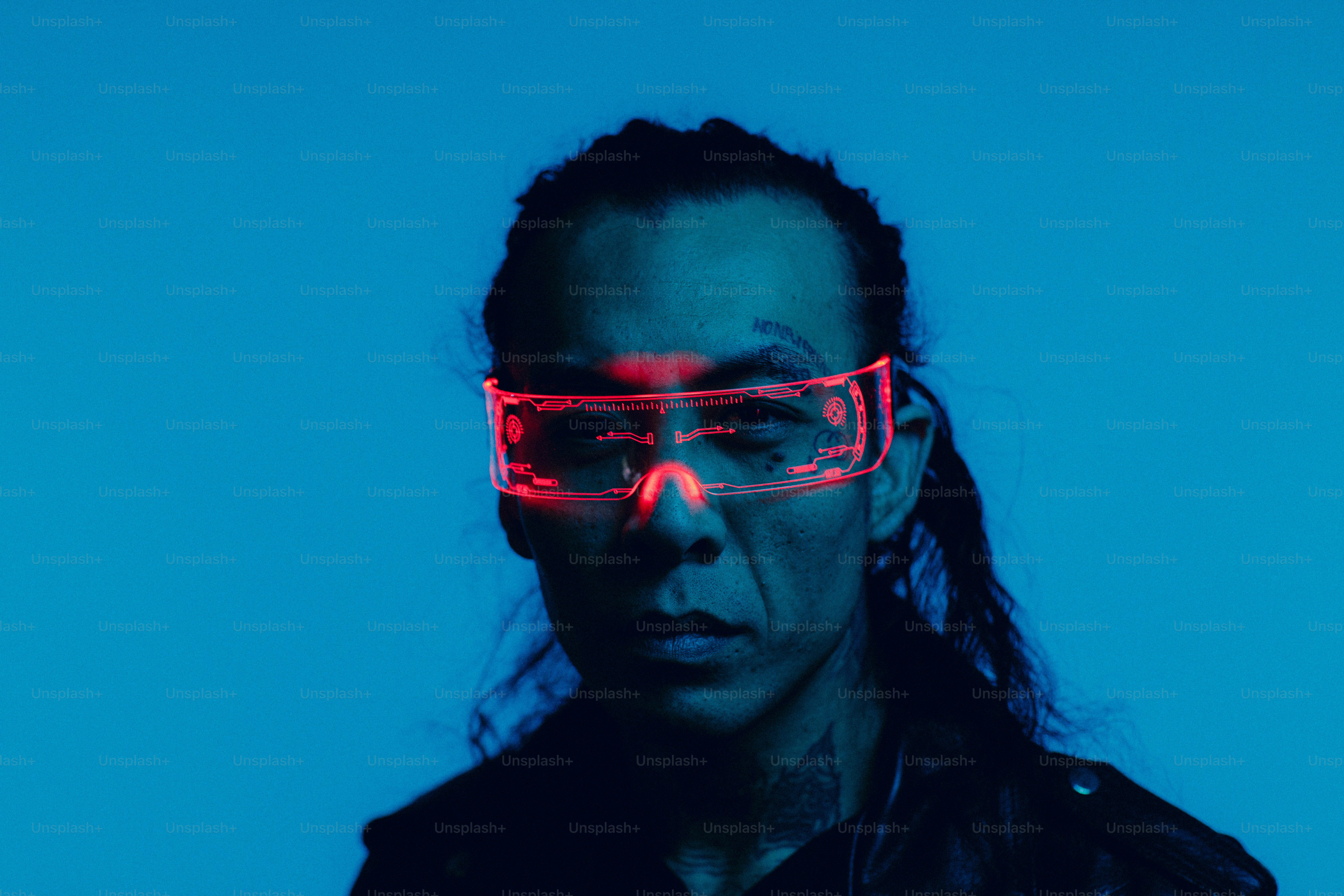 A woman with red light glasses on her face photo – Portrait Image on ...