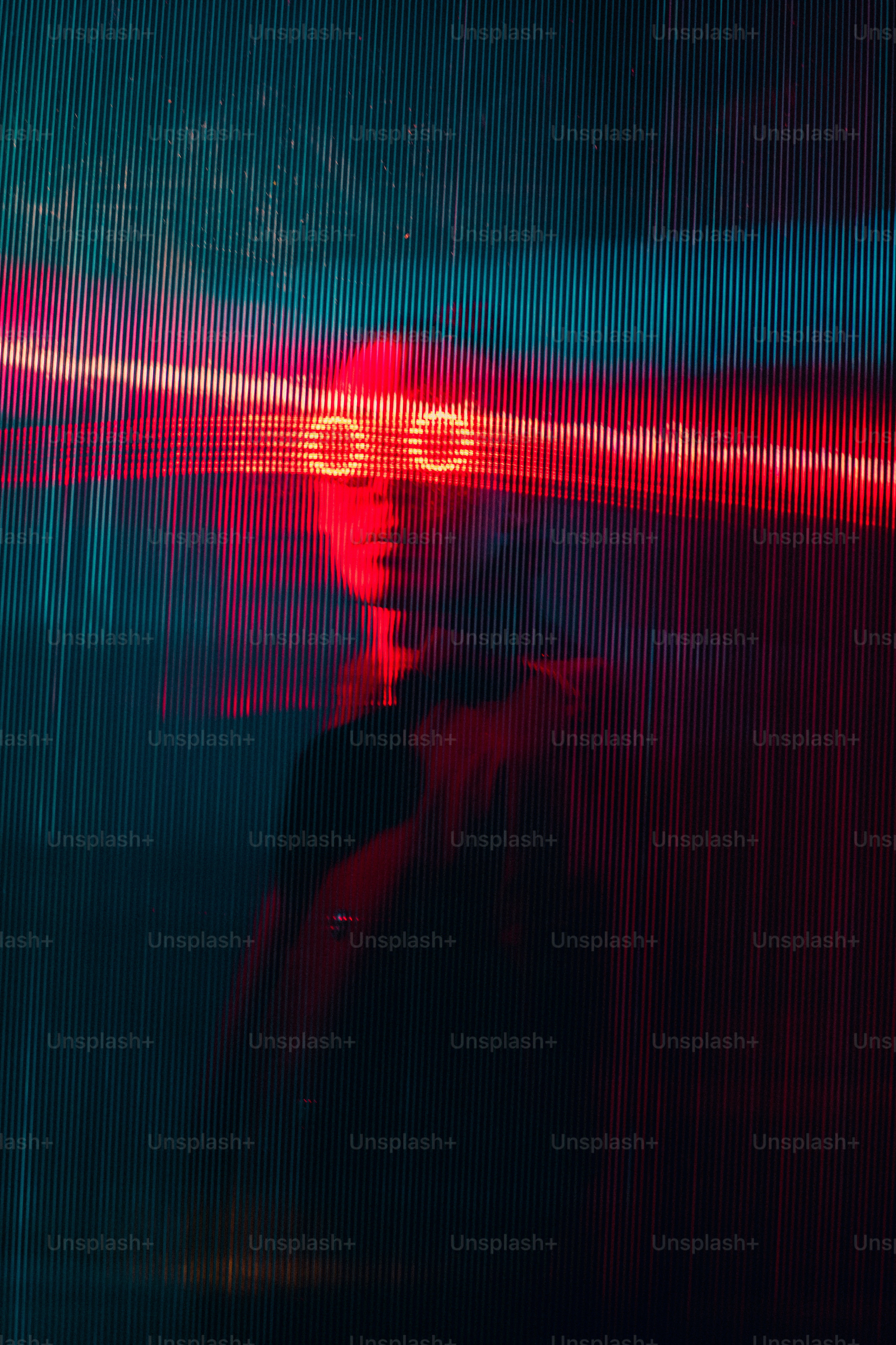 a blurry image of a person in a dark room