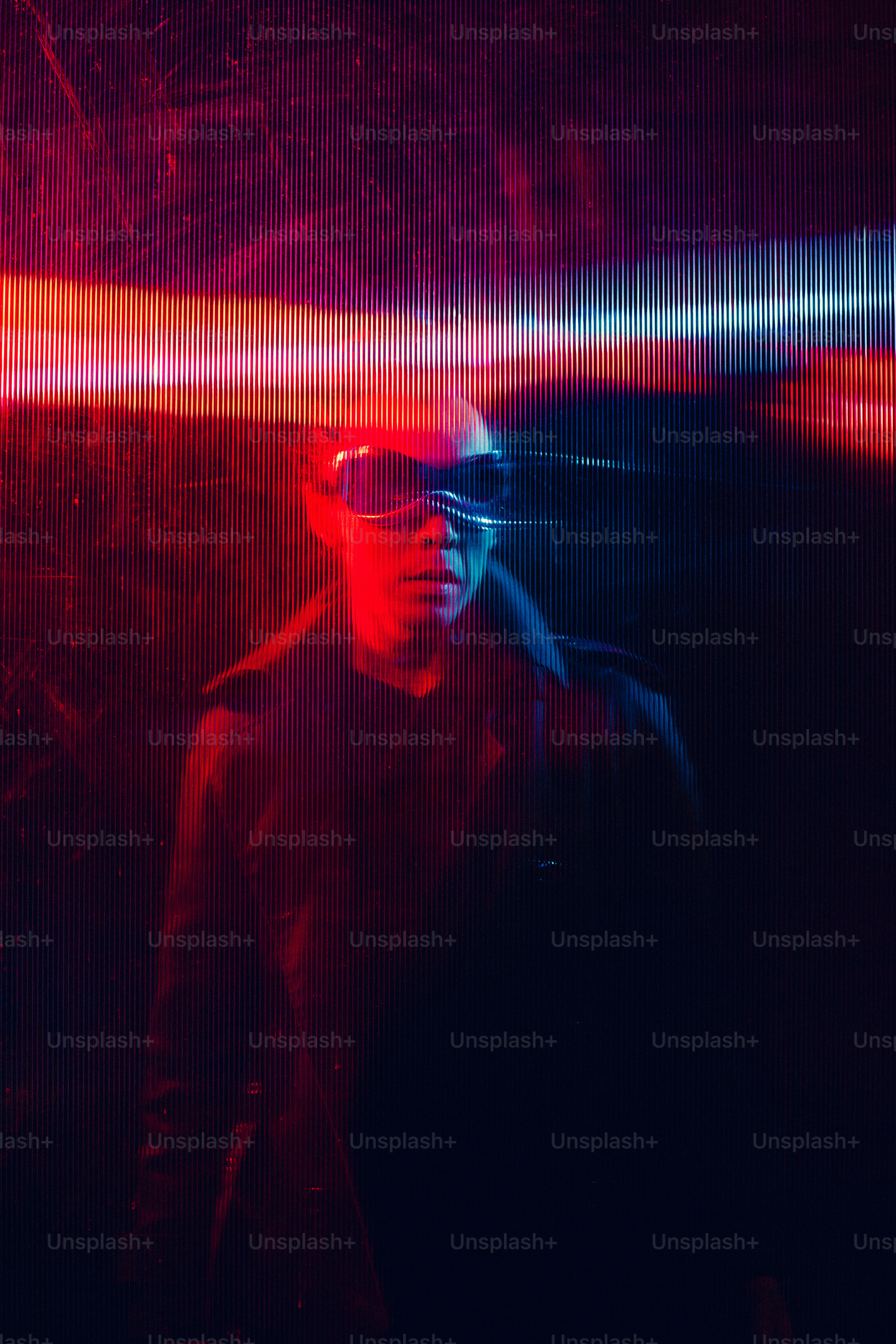 A man standing in front of a red and blue background photo – Abstract ...