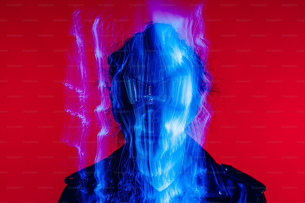 a man in a black leather jacket with blue and red smoke coming out of his