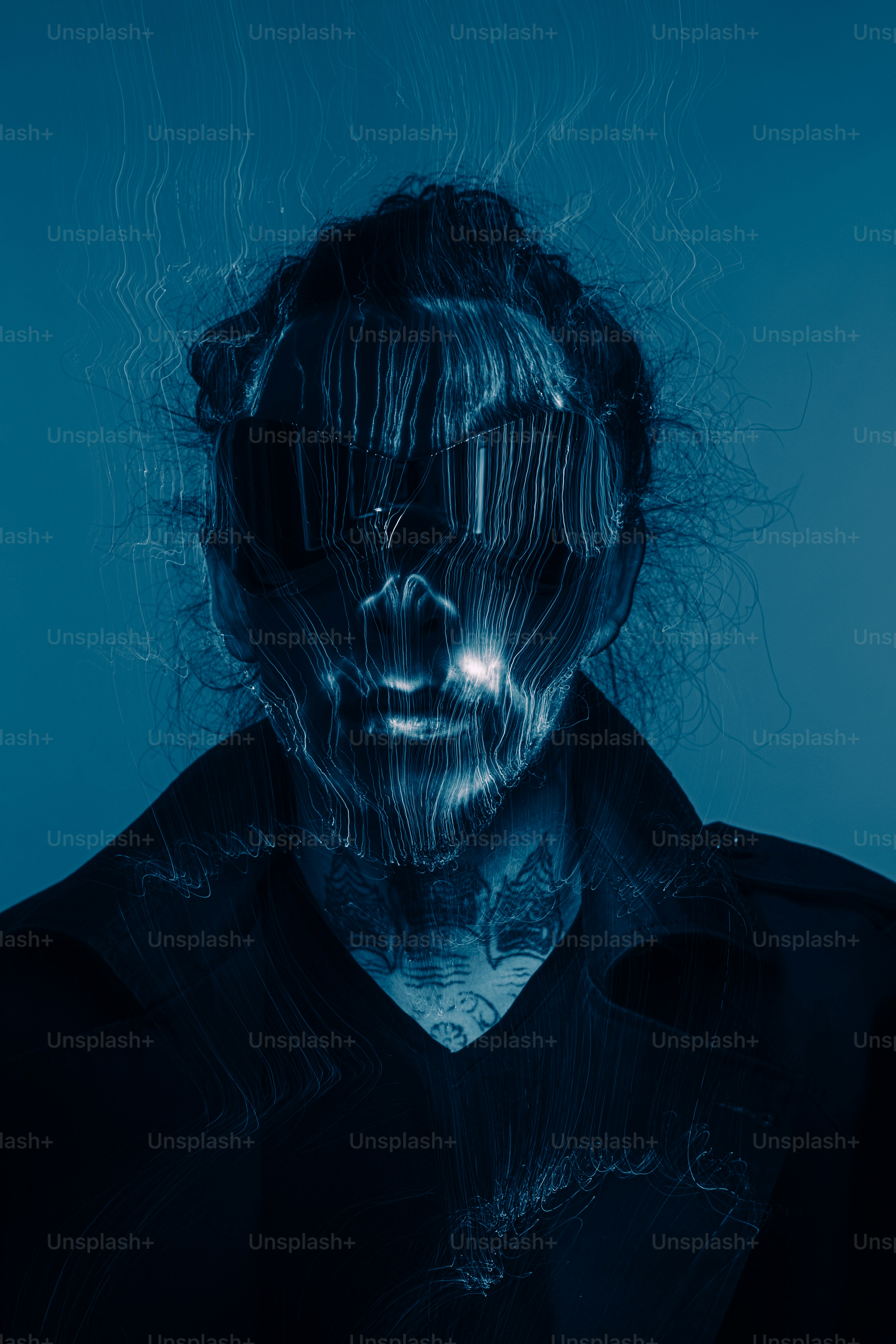 a man with his face covered in plastic wrap