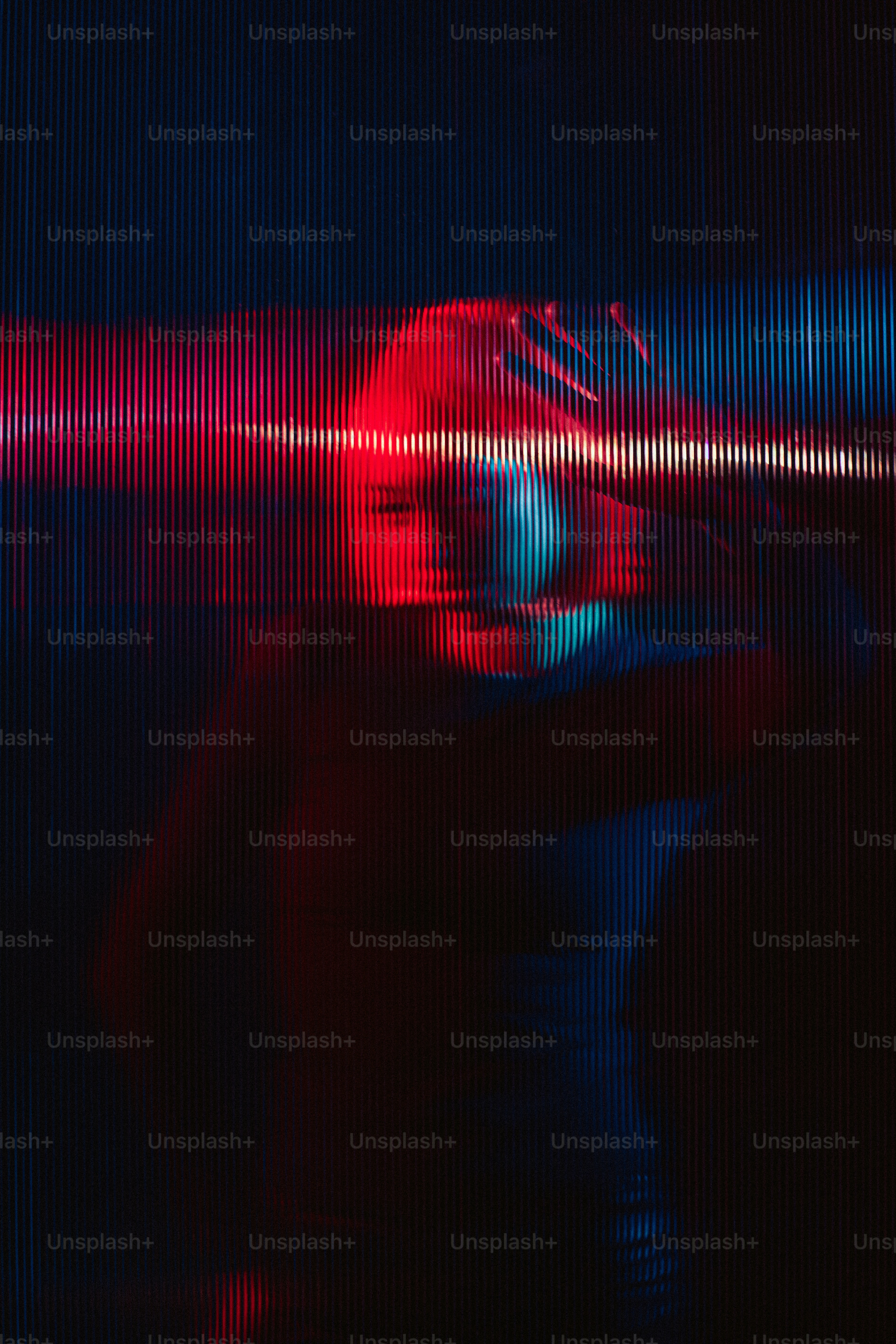 a blurry image of a woman in a black dress