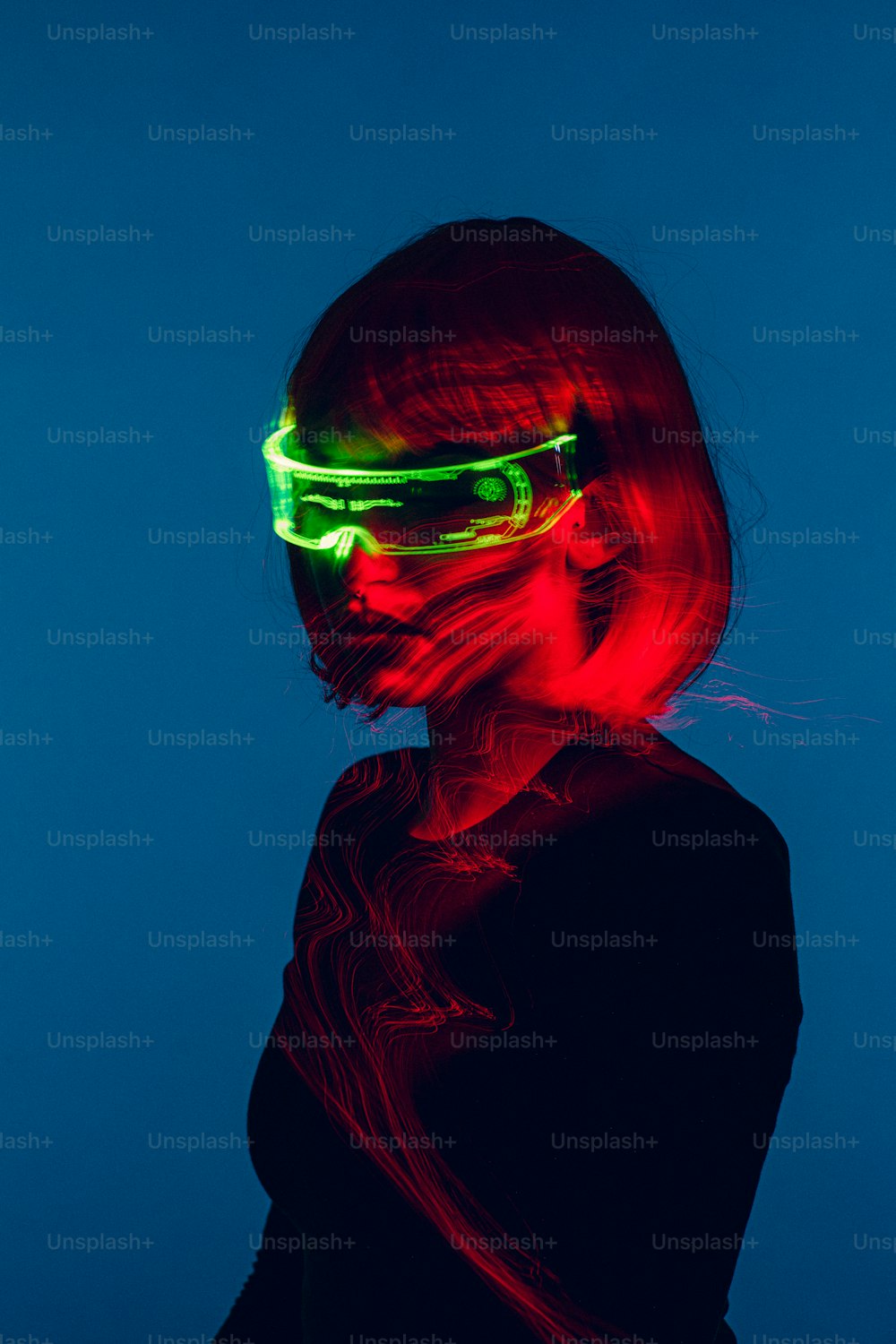a woman with a neon light on her face