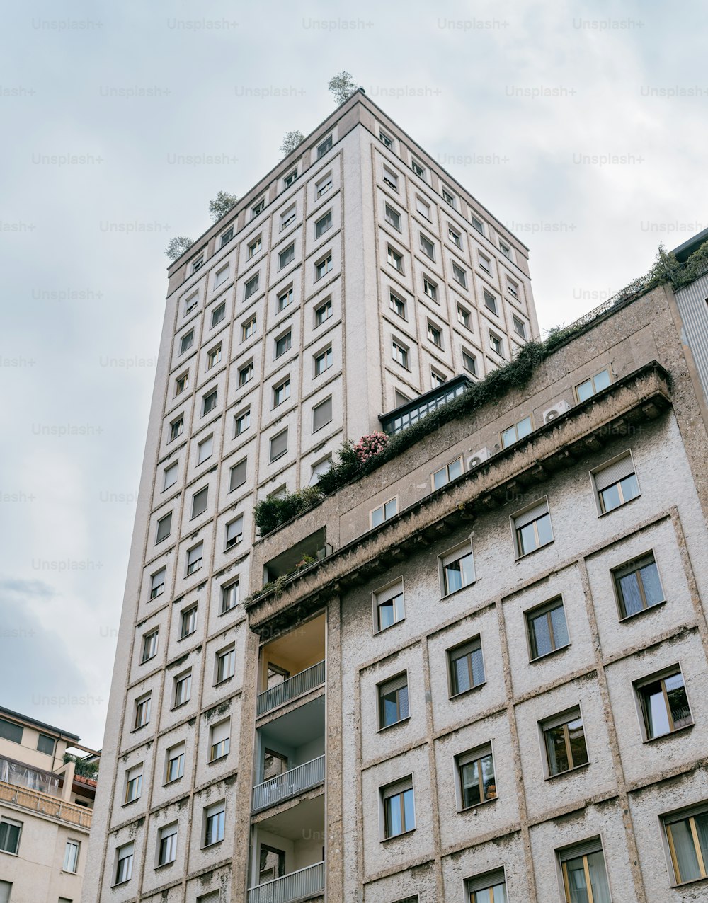 a tall building with a balcony and balconies