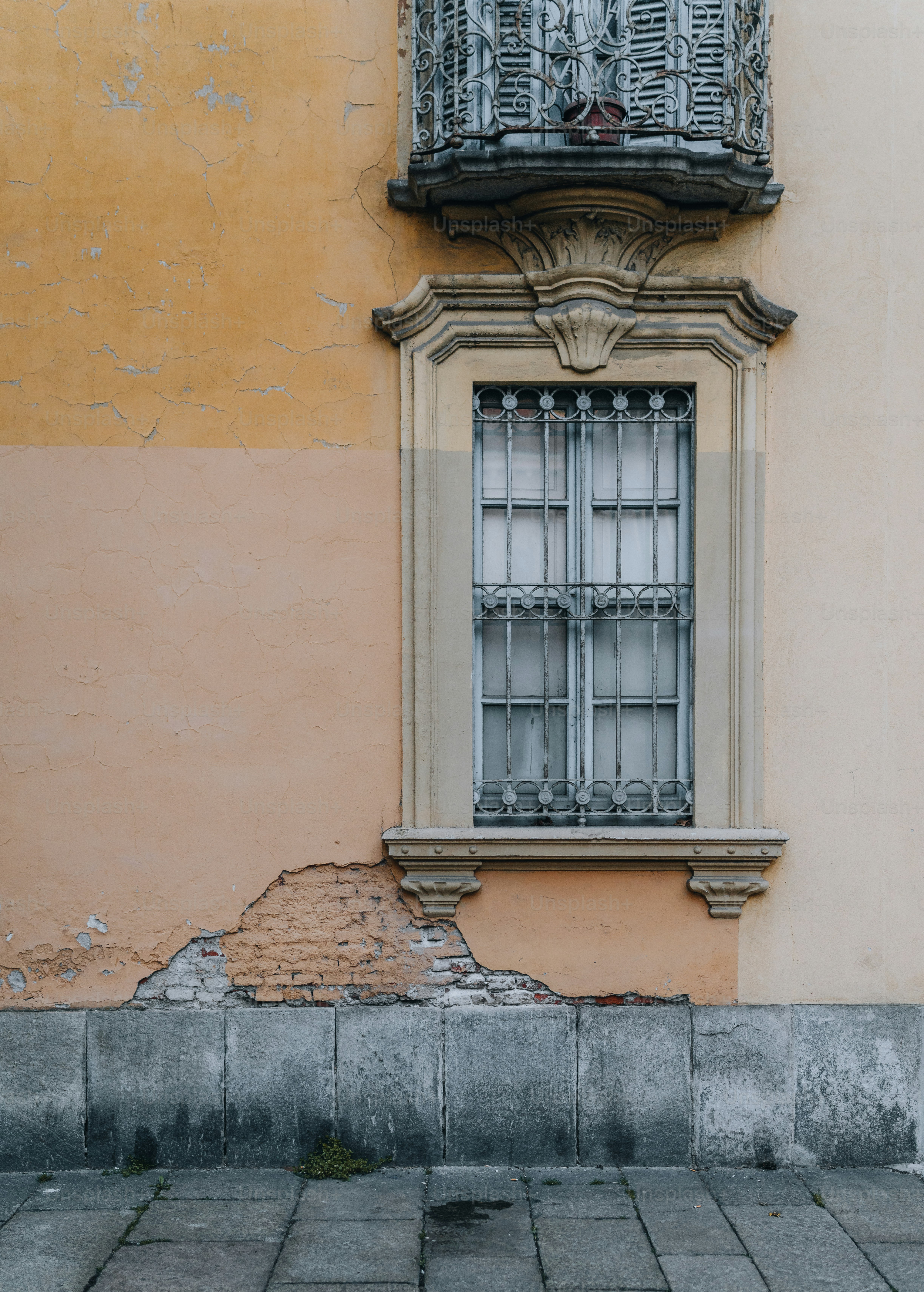 a building with a window and a balcony