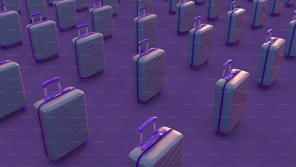 a bunch of suitcases that are on a purple surface