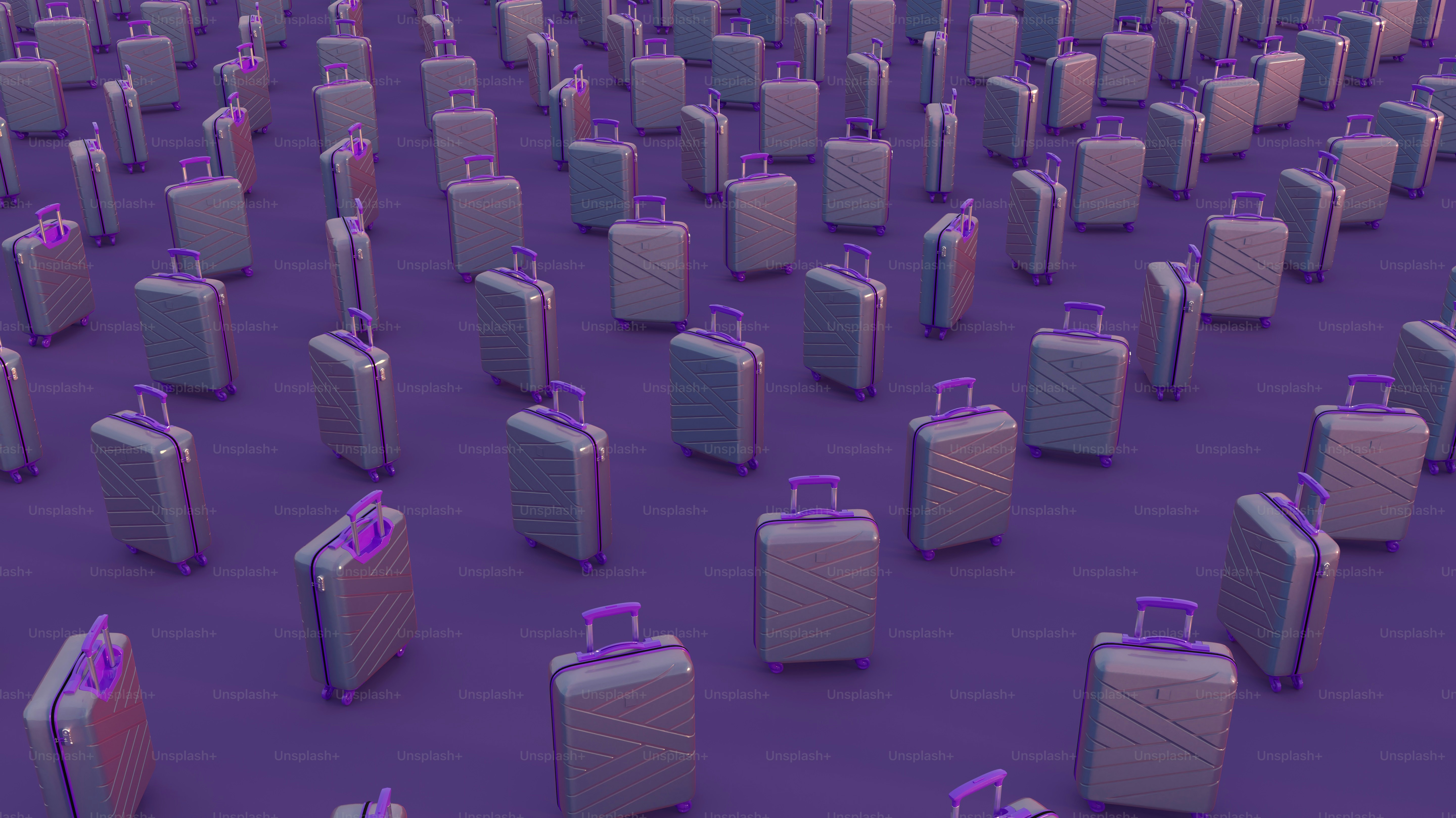 a bunch of suitcases that are in the middle of a floor