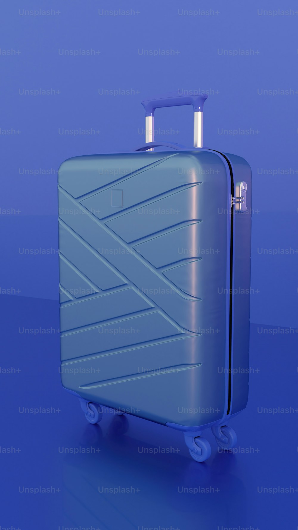 a blue piece of luggage sitting on top of a blue floor